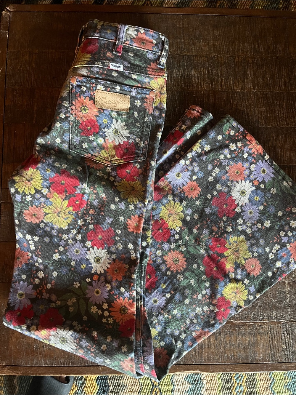 Wrangler like new, high rise, flowered flares.